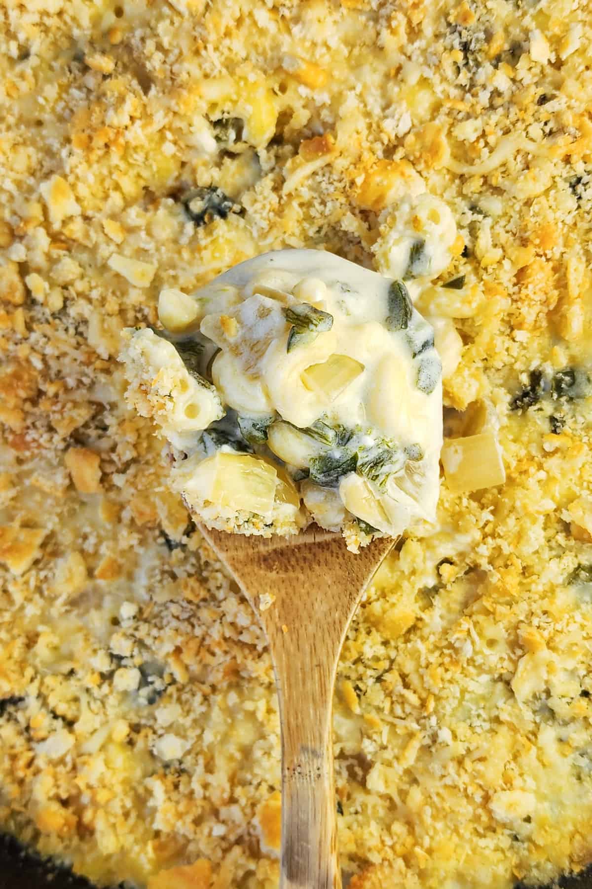 spoon holding poblano mac and cheese