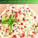 image for pinterest of prepared recipe with text overlay recipe title Christmas Rice Pilaf